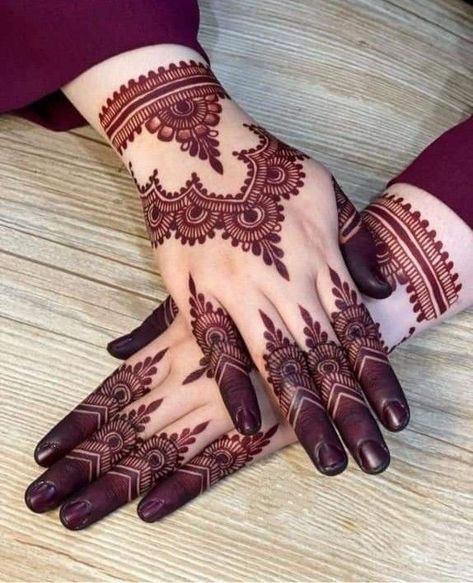 criss cross back hand mehndi design
