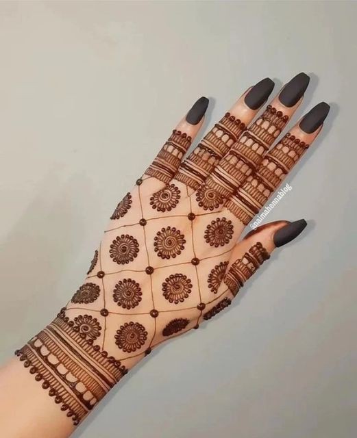 modern back hand mehndi design circle