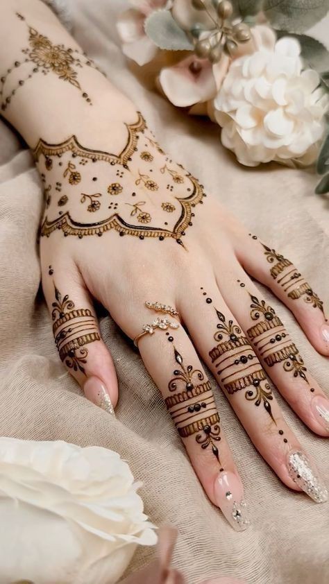 stylish back hand mehndi designs jhumka design